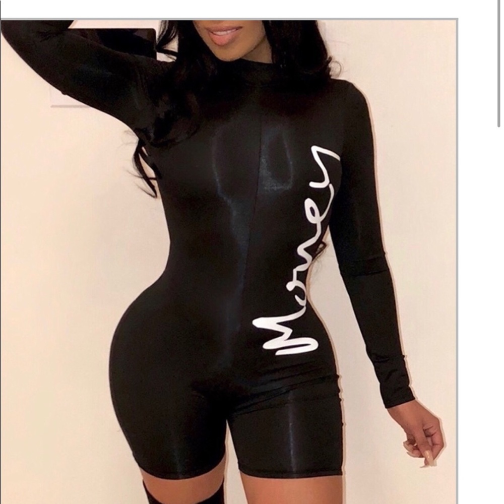 Trendy printed skinny black one piece romper.